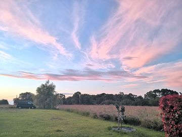 The camping field under a beautiful sky