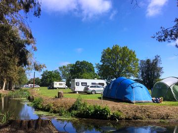 Beckside camping with electric hook-up
