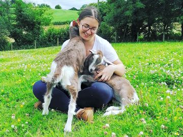 Experience a hands on goat/animal experience included in your stay