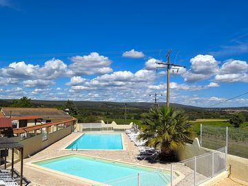 Swimming pools overlooking vineyards