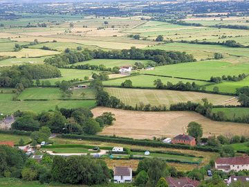 Looking over the site and the countryside from the tor