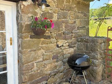 Cottage flowers and barbecue