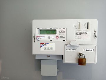 Shower meter takes 20p & £1 coins