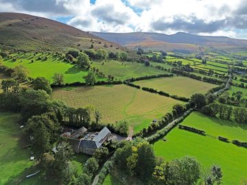 Cwmffrwd farm on the side of waun fach mountain.
