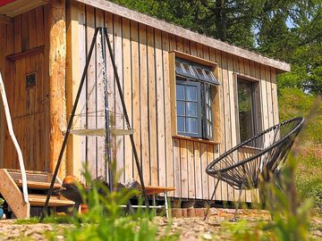 The cabin and firepit area