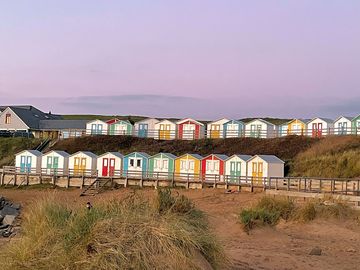 Beach and colourful huts (added by manager 07 dec 2022)