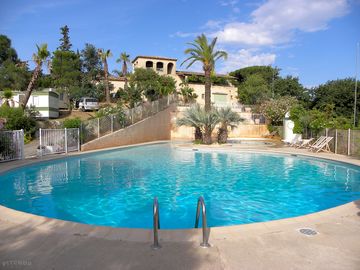 Pool with the site behind
