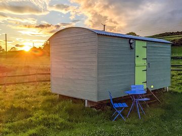 Visitor image of one of the shepherd's huts at sunset (added by manager 26 sep 2022)