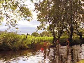 Children playing in the river