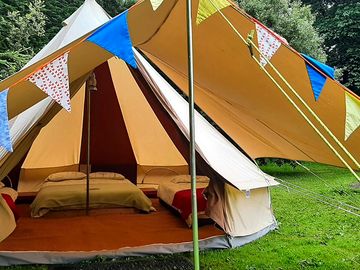 Bell tent with awning and bunting (added by manager 29 jan 2022)