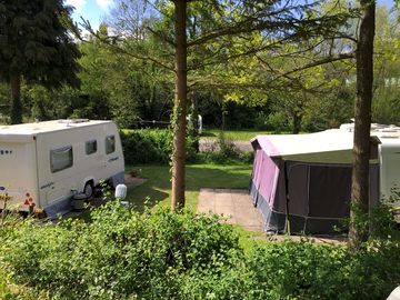 Touring pitches on a leafy site