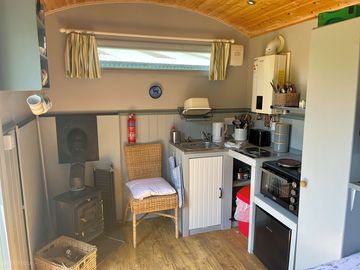 View of galley and wood burning stove (added by manager 30 jun 2023)