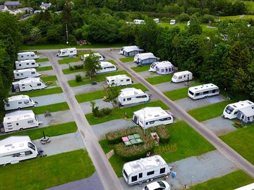 Fully serviced hardstanding touring pitches