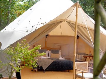 Looking into one of the luxury glamping tents