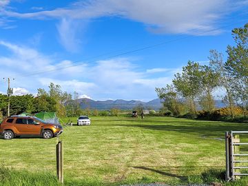 Visitor image of the entrance to the field, showing the great views in the back (added by manager 07 sep 2022)