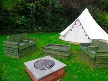 Custom firepit and alfresco seating area