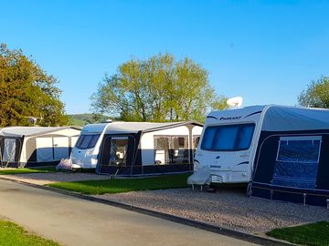 Hardstanding pitch with touring caravan and awning (added by manager 12 oct 2021)