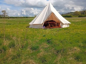 Bell tent exterior with door open