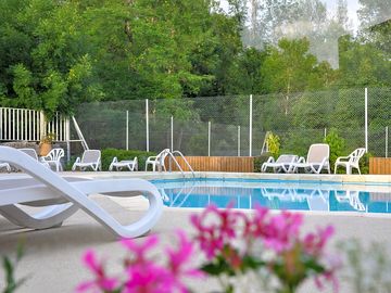 Relax by the swimming pool