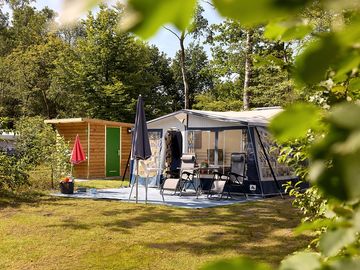 Pitch with bathroom behind