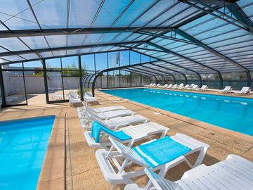 Heated and covered swimming pool area
