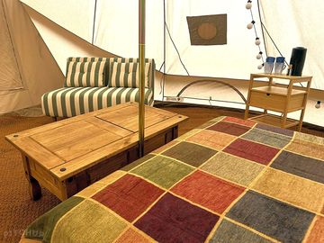 Inside our bell tents, showing a preferred layout.