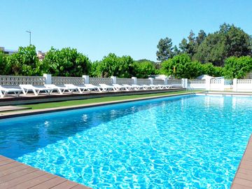 Sunbathe by the pool