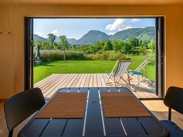 Dining room, decking and mountain view