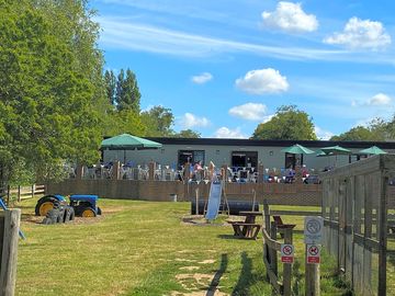 View of the terrace at the coffee shop from the playground (added by manager 19 jul 2022)