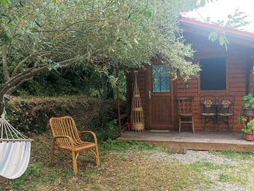 Chalet with a snall private garden and hammock