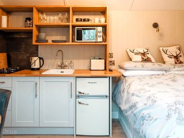 Kitchen and bed