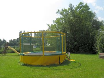 Playground with trampoline