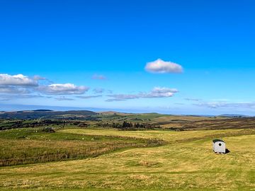 Our shepherd's hut, bertie, sat in the countryside!