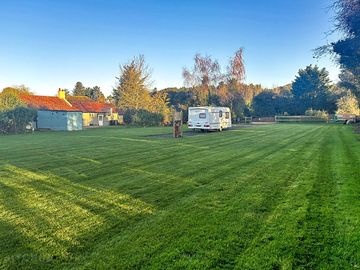 Level grass and gravel pitches