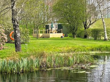 View of shepherd's hut from lake