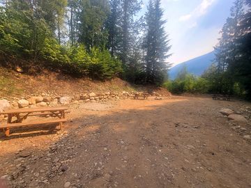 Tent site with picnic table and firepit