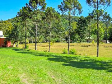 Touring pitches with views of forested hills