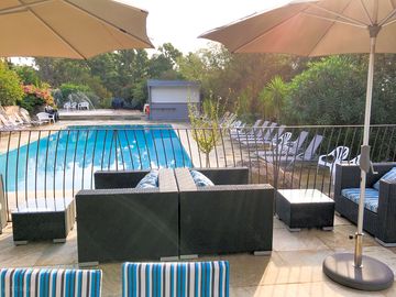 Bar terrace overlooks the swimming pool (added by manager 07 jun 2023)