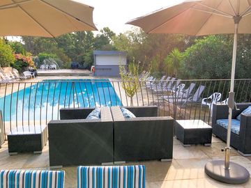 Bar terrace overlooks the swimming pool