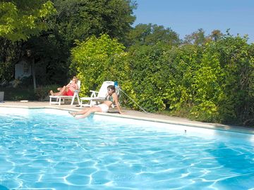 Relax by the swimming pool