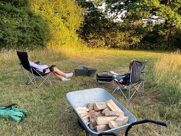Relaxing around the fire by the yurt