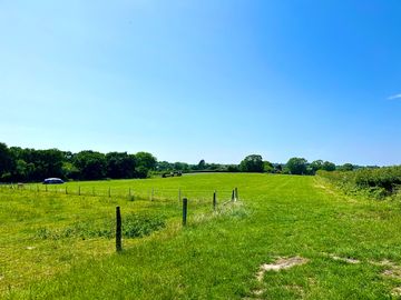 Spacious pitch with views of the purbeck hills and wareham