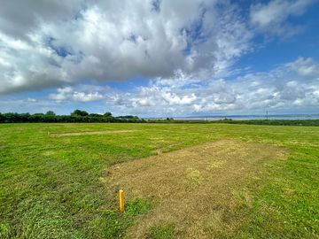 Non-electric grass pitches with sea views