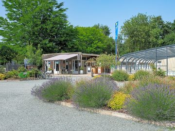 Landscaped site with reception and an indoor pool