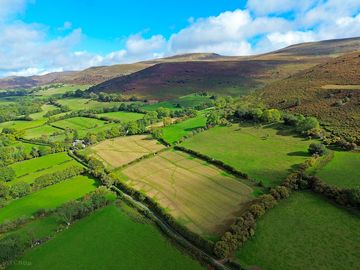 Cwmffrwd farm on the side of waun fach mountain.