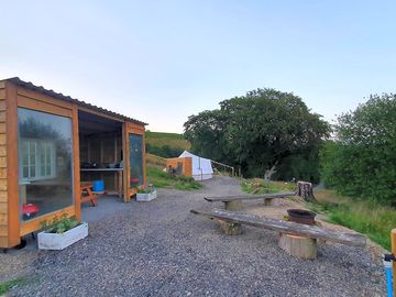 Outdoor kitchen and firepit view
