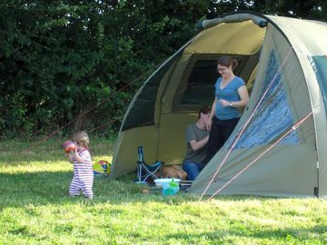 Non-electric grass tent pitch - large tents are welcome