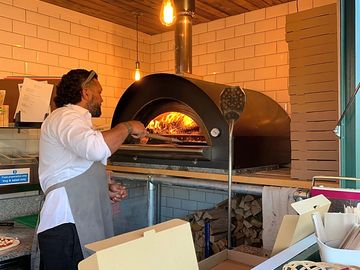 Wood-fired, fresh pizza available onsite