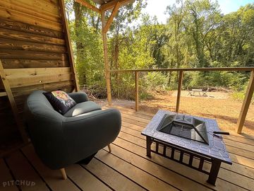 Comfy seating and firepit at the forest shelter (added by manager 14 aug 2023)