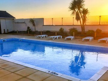 Sunrise over the swimming pool